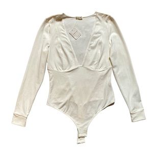 Free people size small white deep cut bodysuit